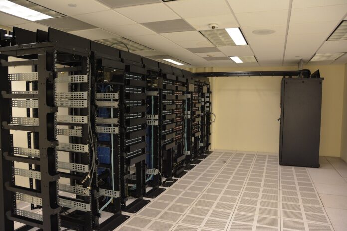 <strong>Updated 28 October 2026.</strong> Super Micro Computer (NASDAQ: SMCI) closed Tuesday at <strong>$35.09</strong>, up $2.40 or 7.34 percent, on about 31.4 million shares, and was quoted at $35.40 before Wednesday's open (StockAnalysis, 9:09 am EDT). The trigger was a Reuters report that Argentum AI, a Super Micro-backed cloud firm, is in talks for $5 billion of financing to buy AI chips. Fiscal Q1 FY27 results follow on <strong>Tuesday 3 November</strong>. <strong>Verdict:</strong> the stock is trading two things at once: a quarter it has already pre-announced well above guidance, and a customer-financing story that is still only talks. Reference levels: <strong>$30 below, $45 above</strong>.
Key facts
<strong>Price:</strong> SMCI $35.09 at Tuesday 27 October's close, up from Monday's $32.69; range $33.23-$35.21, volume 31.4 million shares; pre-market $35.40 on Wednesday. Market value about $23 billion; 52-week range $19.48-$54.08 (StockAnalysis).
<strong>Why it jumped:</strong> Reuters reported on 27 October, citing two people familiar with the matter, that Argentum AI is negotiating a $5 billion chip financing with a major private credit firm. The money would buy more AI chips for a data center Argentum secured in Poland with DL Invest Group, to be leased to customers without investment-grade credit ratings. One source put Argentum's contracted revenue above $12 billion (Reuters, via Investing.com). Terms and timing were not reported.
<strong>The pre-announcement:</strong> on 20 October Super Micro estimated fiscal Q1 FY27 revenue at $18.5-$19.5 billion against guidance of $14.5-$15.5 billion, and gross margin at 12.0-12.5 percent against 10.4-10.8 percent, citing AI platform demand and customer mix (Super Micro 8-K). LSEG consensus had been $15.23 billion; the stock rose 11.1 percent the next session (StockStory). The figures are unaudited.
<strong>Results:</strong> full fiscal Q1 results and the call on Tuesday 3 November (StockAnalysis; Yahoo Finance).
<strong>Analysts:</strong> Hold consensus from 18 analysts, average target $43.27, median $45, low $15 and high $60 (StockAnalysis, updated 26 October). Recent calls: Bernstein's Mark Newman Hold, $42 (26 October); Wedbush Hold, $40 (23 October); Needham's Quinn Bolton Buy, $46, Goldman Sachs' Katherine Murphy Buy, $34, and Bank of America's Ruplu Bhattacharya Sell with a target raised to $38 from $33 (all 21 October).
<strong>Volatility:</strong> the stock has made 67 moves of more than 5 percent over the past year and is up 13.3 percent this year (StockStory).
What the Argentum report does and does not say
The Reuters story is about financing for a customer, not a Super Micro order. Argentum AI is a so-called neocloud, a GPU rental firm, and Reuters describes it as Super Micro-backed without giving the size of any stake. If the $5 billion closes, much of it would be spent on accelerated servers, and Super Micro is the obvious supplier, but neither company has said so. The detail that the chips are for customers without investment-grade ratings matters: private credit is filling the gap that banks leave in AI infrastructure, and that funding is the first thing to tighten if the AI trade cools. Elon Musk wrote on X, as Reuters noted, that debt markets have largely shut out neoclouds without income outside AI data centers (Reuters).
So Tuesday's 7 percent is the market pricing a possible future order, on top of a quarter that is already known. That makes the 3 November call less about the September quarter, which Super Micro has largely disclosed, and more about the December-quarter guide and how much of the backlog depends on customers like Argentum getting funded. The <a href="https://financefeeds.com/super-micro-stock-prediction-32-94-bull-61-64-bear-24-08/">longer-range Super Micro forecast</a> sets out the multi-quarter scenarios; today's moves across AI hardware are on the <a href="https://financefeeds.com/nvidia-nvda-stock-217-94-wednesday-fed-day-microsoft-alphabet-capex-tonight-bull-243-bear-190/">Nvidia page</a> and the <a href="https://financefeeds.com/amd-stock-560-wednesday-after-5-percent-meta-helios-jump-before-3-november-results-bull-658-bear-516/">AMD page</a>.
Why the Street is still at Hold
A revenue pre-announcement about 27 percent above the guidance midpoint would usually bring a wave of upgrades. Instead the consensus stayed at Hold and most new targets cluster between $34 and $46. Bank of America raised its target but kept a Sell rating. Gross margin is the reason: even the raised 12.0-12.5 percent range is thin for a company selling high-priced AI systems, and Super Micro's history of accounting delays still weighs on the multiple. Super Micro reports on the same day as AMD, so 3 November is a double test for AI hardware.
Super Micro into results: bull, base and bear
ScenarioSMCIWhat has to happenAnchor
Bear$30The Argentum talks stall or the Fed spooks credit-funded AI buyers, and the 3 November guide shows margin slipping back toward 11 percent.About 15 percent below Tuesday's $35.09 and below Monday's $32.69 close, undoing Tuesday's jump and part of the pre-announcement rally.
Base$33-$40Results match the pre-announcement and the December guide stays strong, but the market waits for proof of margin.Goldman Sachs' $34 to Wedbush's $40, the range where most recent targets sit.
Bull$45The December guide implies another revenue step up with margin above 12 percent, and the Argentum financing closes with Super Micro named as supplier.The $45 median analyst target, just under Needham's $46.
The bear case sits below Tuesday's close. These are reference levels measured from the verified quotes, not forecasts.
What to watch
<strong>Wednesday 2 pm EDT:</strong> the Fed decision; any hawkish tilt hits credit-funded AI buyers first.
<strong>Wednesday after the close:</strong> Microsoft and Alphabet report; their capital spending sets the demand backdrop for AI servers.
<strong>Any day:</strong> confirmation, or denial, of the Argentum financing and whether Super Micro is named as the hardware supplier.
<strong>Tuesday 3 November:</strong> fiscal Q1 results, gross margin against the 12.0-12.5 percent estimate and the December-quarter guide.
<strong>Quick take:</strong> Super Micro jumped 7.3 percent to $35.09 on Tuesday after Reuters reported that Argentum AI is in talks for $5 billion of chip financing. The September quarter is already pre-announced at $18.5-$19.5 billion, so the 3 November guide and margin decide the next move. A strong guide and a closed Argentum deal open $45; a stalled financing and slipping margin open $30.
FAQ
Why did Super Micro stock go up?
SMCI rose 7.34 percent to $35.09 on Tuesday 27 October 2026 after Reuters reported that Super Micro-backed Argentum AI is in talks for a $5 billion AI chip financing with a private credit firm.
What is Super Micro's stock price today?
SMCI closed at $35.09 on Tuesday 27 October and was quoted at $35.40 in pre-market trading on Wednesday 28 October at 9:09 am EDT (StockAnalysis).
When does Super Micro report earnings?
Super Micro reports fiscal first-quarter 2027 results on Tuesday 3 November 2026.
What did Super Micro pre-announce?
On 20 October it estimated fiscal Q1 revenue at $18.5-$19.5 billion, against guidance of $14.5-$15.5 billion, and gross margin at 12.0-12.5 percent. The figures are unaudited.
What is Argentum AI?
A Super Micro-backed cloud firm that rents AI computing capacity. Reuters reported that it is negotiating $5 billion of financing to buy chips for a data center in Poland developed with DL Invest Group.
What is the analyst price target for SMCI?
The average is $43.27 and the median $45 from 18 analysts with a Hold consensus; targets run from $15 to $60 (StockAnalysis, updated 26 October).
<em>Sources: StockAnalysis (Tuesday close, range, volume, pre-market quote, market value, 52-week range, results date, analyst consensus and recent ratings, 28 October 2026); Reuters via Investing.com (Argentum AI financing talks, 27 October); Super Micro 8-K (fiscal Q1 FY27 preliminary estimates, 20 October); Converge Digest (midpoint increase); StockStory via TradingView (LSEG consensus, 11.1 percent post-update move, volatility, year-to-date return); Yahoo Finance (prior close, results date).</em>
<em>Disclaimer: This article is for informational purposes only and does not constitute financial or investment advice. Stock prices are volatile. Do your own research and consult a licensed financial adviser before making investment decisions.</em>