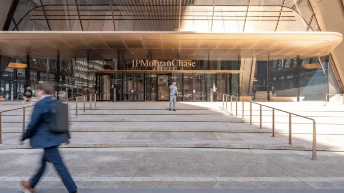 The lazy reading of Tuesday's bank tape is that the prints beat and the Dow opened about 0.7 percent higher. JPMorgan missed, and as of 8:14 a.m. Eastern the cash session had not opened. The firm reported third-quarter 2026 earnings of $5.57 a share, against the $5.90 LSEG estimate on CNBC, and managed revenue of $50.9 billion against $51.22 billion. The $5.75 figure that excludes a securities loss is still short of $5.90. Wells Fargo's $1.87 beat a $1.85 estimate and missed revenue. Goldman Sachs reported $18.68 billion of net revenue against $16.71 billion. Dow futures, not the Dow, were up 0.68 percent at 8:04 a.m. Eastern, versus their own prior price. The gap in the coverage is that split, plus a JPMorgan premarket last of $335.00 at 8:14 a.m., only 0.21 percent above Monday's $334.30 close, after an earlier bounce that did not hold. CNBC's open put the Dow at 52,092.99, up 0.47 percent from 51,850.55, not 0.7 percent. Citigroup later reported $2.85 a share.
Key facts
JPMorgan reported third-quarter 2026 net income of $15.3 billion, or $5.57 a share, and managed revenue of $50.9 billion. Excluding $658 million of securities losses, EPS was $5.75. Source: Exhibit 99.1, filed 13 October 2026.
LSEG via Sara Salinas, CNBC <a href="https://www.cnbc.com/2026/10/13/bank-earnings-live-updates.html">live blog</a>, 13 October 2026: $5.57 versus $5.90 and $50.91 billion versus $51.22 billion. Hugh Son at 6:51 a.m. had shares off about 3.5 percent. Salinas at 7:19 a.m. had them up about 1 percent as of about 7:20 a.m.
Wells Fargo reported diluted EPS of $1.87, revenue of $21.870 billion, and net interest income of $12.517 billion. Source: Exhibit 99.1, 13 October 2026. CNBC: LSEG $1.85 and $22.3 billion, StreetAccount net interest income $12.66 billion.
Goldman Sachs reported net revenues of $18,679 million and diluted EPS of $17.01, after about $1.00 from charity. Source: Exhibit 99.2, 13 October 2026. CNBC: $18.68 billion versus $16.71 billion, and $17.01 may not compare with $13.02.
Monday 12 October 2026 Nasdaq closes: JPMorgan $334.30, Wells Fargo $83.32, Goldman Sachs $893.95. Source: <a href="https://www.nasdaq.com/market-activity/stocks/jpm/historical">Nasdaq historical prices</a>, downloaded 13 October 2026.
CNBC premarket, 8:14 a.m. Eastern, 13 October 2026: JPMorgan $335.00, up 0.21 percent, Wells Fargo $82.01, down 1.57 percent, Goldman Sachs $935.00, up 4.59 percent, Citigroup $130.50, down 1.08 percent. Not an open. At 7:53 a.m. JPMorgan was $336.20.
Dow futures 52,462, up 0.68 percent at 8:04 a.m. Eastern versus a prior futures price of 52,110. S&P 500 futures 7,849.25, down 0.11 percent. Monday cash closes: Dow 51,850.55, S&P 500 7,807.24. Source: CNBC quotes, 13 October 2026.
The Treasury 10-year closed Friday 9 October 2026 at 5.24 percent. Source: the <a href="https://home.treasury.gov/resource-center/data-chart-center/interest-rates/daily-treasury-rates.csv/2026/all?type=daily_treasury_yield_curve&field_tdr_date_value=2026&page&_format=csv">Treasury daily yield curve</a>. Tradeweb's US10Y print at 8:14 a.m. Tuesday was 5.185 percent, previous 5.244 percent.
What just happened, and why the obvious reading is wrong
A beat is a result against a named consensus. JPMorgan missed both LSEG lines. The gap is $0.33 a share, 5.6 percent of the $5.90 estimate. CNBC's $50.91 billion revenue line is $0.31 billion, or 0.6 percent, under $51.22 billion. Reported revenue of $50.2 billion is a different line, $1.02 billion under that estimate. The $658 million pretax securities loss, $498 million after tax, adds only $0.18, so $5.75 is still $0.15, or 2.5 percent, short. Hugh Son noted JPMorgan had topped EPS estimates in 16 of the prior 20 quarters, per StreetAccount.
The path inside the morning is what a single headline drops. Hugh Son wrote at 6:51 a.m. Eastern that the shares were off about 3.5 percent. Sara Salinas wrote at 7:19 a.m. that they were up about 1 percent as of about 7:20 a.m. The 7:53 a.m. CNBC last was $336.20, up 0.57 percent, and Nasdaq's was $336.05, up 0.52 percent. The 8:14 a.m. CNBC last was $335.00, up $0.70, or 0.21 percent. A 3.5 percent dip from $334.30 is about $322.60. Neither saved last is that price, and the bounce had already faded.
Wells Fargo cleared EPS by $0.02 and missed revenue by $0.43 billion. Net interest income of $12.517 billion is $0.143 billion under the $12.66 billion StreetAccount figure Laya Neelakandan cited. The 8:14 a.m. last was $82.01, down 1.57 percent. <a href="https://financefeeds.com/wells-fargo-reports-tuesday-will-its-kraken-crypto-talks-come-up-on-the-call/">FinanceFeeds' Monday note</a> carried the $1.85 expectation. The print cleared it and missed the top line.
Goldman beat revenue by $1.97 billion, or 11.8 percent. Salinas wrote that $17.01 "may not compare" with $13.02, and charity cut EPS by about $1.00. Forcing a 30.6 percent earnings gap ignores that caveat. The 8:14 a.m. last was $935.00, up 4.59 percent.
Citigroup had no 8-K at about 8:14 a.m., and the premarket last was $130.50, down 1.08 percent. <a href="https://www.citigroup.com/rcs/citigpa/storage/public/Earnings/Q32026/2026prqtr3rslt.pdf">Citigroup's 13 October release</a> later reported net income of $5.2 billion, or $2.85 a share, on revenue of $23.8 billion. The table lines are $5,245 million and $23,845 million, against $3.8 billion, $1.86, and $22.1 billion a year earlier. CNBC at 7:53 a.m. had LSEG at $2.66 and $23.72 billion. The $2.85 print is a beat of that earnings line. The 11 a.m. Eastern call was still ahead of this check.
Who is exposed
Holders of JPMorgan are marked to Monday's $334.30, and the 8:14 a.m. last was only $0.70 above it. The high close in the Nasdaq file is $365.18 on 12 August 2026, so Monday is $30.88, or 8.5 percent, below it. The low close is $282.84 on 27 March 2026. Book value was $132.30 at 30 September, and Monday is 2.53 times that book. The bear case stays above book.
The other names are not one factor. At 8:14 a.m. Wells Fargo was down 1.57 percent, Goldman was up 4.59 percent, and Citigroup was down 1.08 percent before the release. Bank of America was $54.35, down 0.42 percent, and Morgan Stanley was $194.05, up 2.12 percent, both ahead of Wednesday. Monday closes were $83.32, $893.95, $131.92, $54.58, and $190.02.
Dow futures at 52,462 were up 0.68 percent from their own prior price of 52,110, and $611.45, or 1.18 percent, above Monday's cash close of 51,850.55. The 0.68 percent is not the distance from the cash Dow. S&P futures at 7,849.25 were down 0.11 percent from 7,858 and $42.01, or 0.54 percent, above Monday's cash close of 7,807.24, which itself was down 0.06 percent. A flat S&P near 7,800 is that Monday close, not a Tuesday open.
JPMorgan's card net charge-off rate was 2.91 percent, and investment banking fees rose 14 percent from a year earlier and fell 8 percent from the prior quarter. CNBC, citing Dealogic, said global investment banking revenue fell 6.6 percent to $27.2 billion. As reported by CNBC, Brian Moynihan warned in September that Bank of America's third-quarter fees were headed for a drop of more than 10 percent.
What the tape and the primary documents show
Results below are from the releases. Estimates are CNBC's LSEG or StreetAccount lines. The last column is the CNBC extended quote at 8:14 a.m. Eastern on 13 October 2026, not a close.
NameResult on 13 Oct 2026Named estimatePremarket, 8:14 a.m.
JPMorganEPS $5.57, managed revenue $50.9 billion. Ex-item EPS $5.75LSEG $5.90 and $51.22 billion$335.00, up 0.21 percent, from $334.30
Wells FargoEPS $1.87, revenue $21.870 billion, net interest income $12.517 billionLSEG $1.85 and $22.3 billion. StreetAccount NII $12.66 billion$82.01, down 1.57 percent, from $83.32
Goldman SachsNet revenue $18.68 billion, EPS $17.01 after about $1.00 of charityLSEG $16.71 billion. EPS $13.02 may not compare$935.00, up 4.59 percent, from $893.95
Citigroup$2.85, net income $5.2 billion, revenue $23.8 billionLSEG $2.66 and $23.72 billion at 7:53 a.m.$130.50, down 1.08 percent, from $131.92
Markets revenue rose 15 percent from a year earlier, fixed income markets fell 4 percent, and equity markets rose 49 percent. Expense was $27.3 billion. Hugh Son put fixed income trading at $5.4 billion, about $550 million under StreetAccount, with costs up 12 percent and revenue up 8 percent. Average loans were $1.6 trillion and average deposits $2.7 trillion. CET1 was 13.9 percent standardized.
Monday's bar opened and closed at $334.30, up $1.31 from Friday's $332.99.
Source: Nasdaq daily closes for JPMorgan and Goldman Sachs, 1 October 2025 through Monday 12 October 2026. The marker is Monday's JPMorgan close, $334.30. Goldman is rebased to 100 on 1 October 2025 and ends at 113.8. An 8:14 a.m. Tuesday premarket last of $335.00 is not a bar. Chart: FinanceFeeds.
Wells Fargo's taxable-equivalent net interest margin was 2.43 percent, down from 2.61 percent a year earlier, while net interest income was still up 5 percent from a year earlier. CET1 was 10.0 percent. ROTCE was 16.3 percent.
What Dimon, Scharf and Solomon said
Jamie Dimon, chairman and chief executive of JPMorgan Chase, did not call it a miss. In <a href="https://www.sec.gov/Archives/edgar/data/19617/000162828026065582/a3q26erfexhibit991narrative.htm">Exhibit 99.1</a> he said: "The Firm reported another quarter of strong results, generating net income of $15.8 billion and an ROTCE of 21%, excluding discretionary investment securities losses totaling $498 million after tax." Markets revenue and investment banking fees each rose at a mid-teens rate, "although activity did moderate somewhat during the quarter," and "In line with our hierarchy, we reduced share repurchases this quarter." He also said "large fiscal deficits, sticky inflation, elevated asset prices, rising interest rates and geopolitical conditions continue to shift under the surface."
Charlie Scharf, chairman and chief executive of Wells Fargo, tied $1.87 to growth rather than to the estimate. In <a href="https://www.sec.gov/Archives/edgar/data/72971/000007297126000318/wfc3qer10-13x26ex991xrelea.htm">Exhibit 99.1</a> he said: "Our third quarter results reflect broad-based growth, higher earnings, and stronger returns. Diluted earnings per share increased to $1.87 in the third quarter, up 13% from a year ago." He also said: "While higher interest rates, higher oil prices and persistent inflation create risks to the economy, strong positive forces such as the investment in AI infrastructure, high employment levels and consistent wage growth continue to outweigh the risks." Laya Neelakandan wrote that full-year net interest income and expense guidance were maintained.
David Solomon, chairman and chief executive of Goldman Sachs, said on the <a href="https://www.sec.gov/Archives/edgar/data/886982/000088698226000529/a3q26gsearningsresultspr.htm">earnings presentation</a>: "Against the backdrop of a complicated operating environment, our clients continued to turn to Goldman Sachs for our world-class advice, execution and financing capabilities, resulting in our second highest quarterly net revenues and record year-to-date net revenues." Hugh Son, on CNBC, put equities revenue at $6.44 billion, about $1.42 billion above estimates, and fixed income at $3.47 billion, $239 million short. The slides put ROTCE at 20.5 percent.
At 7:56 a.m. Eastern, @4damsENS <a href="https://x.com/4damsENS/status/2109976642462577033">posted</a> the $5.57 miss and then wrote that shares were lower premarket. That price line does not match $335.00 at 8:14 a.m. At 7:58 a.m., @traphabits101 <a href="https://x.com/traphabits101/status/2109977109330571653">posted</a> that Wells Fargo beat on profit and was light on revenue, that $17.01 was a massive beat, and that Citigroup was due. "Massive beat" is that account's label. "Due" matched the missing 8-K at that hour.
The rate tension is a level, not a morning jump
An 8 October Reuters preview returned a 401 here, so those sentences are not used. The Treasury 10-year was 5.24 percent on Friday 9 October, 5.22 percent on 8 October, 5.28 percent on 7 October, and 5.31 percent on 5 October. The level is high. Friday was not the week's high. Tuesday's 8:14 a.m. Tradeweb print of 5.185 percent was about 6 basis points under 5.244 percent and about 5.5 basis points under Friday's close. That is a dip, not a jump into the prints.
Dimon lists rising rates as a risk. Scharf lists them as a risk that AI investment and wages still outweigh. The outlook slide then supports a 2027 case of about $107 billion of net interest income excluding markets, "driven by the impact of balance sheet growth and higher rates."
Leslie Picker and Ritika Shah said the firm raised 2026 net interest income to about $106.2 billion, from a prior $105.5 billion, and expense to about $108.6 billion, from $107.5 billion. Card net charge-offs are guided near 3.2 percent, against 2.91 percent this quarter. <a href="https://financefeeds.com/nvidia-closes-at-a-record-while-yields-flash/">FinanceFeeds' 6 October yield note</a> is a different tape.
Bull, base and bear
The spot is Monday's official close, $334.30. Volatility is the last 90 daily log-returns in the Nasdaq file, after the 3 June 2026 close through 12 October 2026. The mean is 0.00117141 a day. The sample standard deviation is 0.01255585, about 19.9 percent if scaled by the square root of 252. The horizon is 56 New York sessions from Tuesday 13 October through Thursday 31 December 2026, dropping Thanksgiving on 26 November and Christmas on 25 December. Bull is 1.5 standard deviations up, with no drift. Bear is 1.0 standard deviation down, with no drift. Base is the drift alone. This is not financial advice.
The square root of 56 is 7.48331. Then 1.5 times 0.01255585 times 7.48331 is 0.140939, and $334.30 times the exponential of that is $384.90, up $50.60, or 15.1 percent. The bear exponent is 0.093959, and $334.30 times the exponential of the negative is $304.32, down $29.98, or 9.0 percent. Drift over 56 sessions is 0.065599, and $334.30 times that exponential is $356.97, up $22.67, or 6.8 percent. The base is above the spot because those 90 sessions averaged about 0.117 percent a day. The bull does not add that drift on top.
CasePriceVersus Monday's $334.30What has to be true by 31 December 2026
Bull$384.90Up $50.60, or 15.1 percent1.5 standard deviations, no drift, across 56 sessions. The $106.2 billion 2026 net interest income path holds. The level is $19.72 above the 12 August close of $365.18.
Base$356.97Up $22.67, or 6.8 percentDrift only, from the 0.117 percent average daily log-return over 56 sessions. Still $8.21 under the August high.
Bear$304.32Down $29.98, or 9.0 percent1.0 standard deviation down, no drift. Still above the 27 March close of $282.84 and 2.30 times book value of $132.30.
These are not Street targets. A separate <a href="https://financefeeds.com/bitcoin-price-83000-week-ahead-cpi-bank-earnings-bull-87500-bear-80000/">FinanceFeeds note on this week's bitcoin tape</a> uses its own bull and bear. Those levels are not JPMorgan's. The August high of $365.18 sits between the base and the bull.
What happens next
The cash open is in. CNBC's open, checked at 9:43 a.m. Eastern, had JPMorgan at $339.97, up 1.70 percent from Monday's $334.30, above the $335.00 last at 8:14 a.m. Goldman was $923.00, up 3.25 percent from $893.95 and under the $935.00 premarket last. Wells Fargo was $80.57, down 3.30 percent from $83.32, through the $82.01 premarket last. Citigroup was $131.35, down 0.43 percent from $131.92, so the $2.85 beat did not flip the open positive. The 0.68 percent futures change was not this open.
On Wednesday 14 October, before the open, Bank of America and Morgan Stanley report. The chain is the 8:14 a.m. scatter: Goldman up 4.59 percent, Wells Fargo down 1.57 percent, JPMorgan up 0.21 percent. Clean beats on both earnings and revenue would be new. Citigroup's release is out at $2.85. The 11 a.m. call is the next test.
By the 31 December 2026 close the levels are $384.90, $356.97, and $304.32. The bull needs implied 2026 net interest income of about $106.2 billion to hold, with the $0.18 securities item staying a one-quarter item. The bear is one standard deviation of the last 90 sessions and does not require the March low. The base is that positive drift continuing, which is why $356.97 sits above $334.30 without a new beat.
Frequently asked questions
Did the Tuesday prints beat, and do Dow futures up 0.68 percent justify the tape?
No. JPMorgan's $5.57 missed the $5.90 LSEG estimate, and $5.75 excluding the securities loss missed it too. Wells Fargo beat by two cents and missed revenue. Goldman beat on revenue, with $17.01 flagged as not comparable to $13.02. Dow futures up 0.68 percent at 8:04 a.m. were not the cash open. Citigroup later reported $2.85 against the $2.66 LSEG line.
What did JPMorgan report, and what did the premarket actually do?
Net income was $15.3 billion, or $5.57 a share, on managed revenue of $50.9 billion. Excluding the securities loss, EPS was $5.75, still under the $5.90 LSEG line. Shares were about 3.5 percent lower at 6:51 a.m. on CNBC and about 1 percent higher by 7:20 a.m. The 8:14 a.m. last was $335.00, up 0.21 percent from $334.30.
Did Wells Fargo beat on profit?
On earnings per share, yes, by two cents: $1.87 against an LSEG estimate of $1.85. Revenue was $21.870 billion against $22.3 billion, and net interest income was $12.517 billion against StreetAccount's $12.66 billion. At 8:14 a.m. the premarket last was $82.01, down 1.57 percent. The profit beat did not carry the top line.
Why is Goldman's $17.01 not a clean beat of $13.02?
Sara Salinas wrote on CNBC that $17.01 may not compare with the $13.02 LSEG estimate. Revenue is the clean line: $18.68 billion against $16.71 billion, a gap of $1.97 billion. The slides say charitable contributions reduced diluted EPS by about $1.00. Forcing the earnings division is a 30.6 percent gap. The 8:14 a.m. premarket move was 4.59 percent, to $935.00, which is not that gap.
Did the Dow open about 0.7 percent higher?
No. CNBC's open was 52,092.99, up 0.47 percent from Monday's 51,850.55. The S&P 500 open was 7,795.27, down 0.15 percent from 7,807.24. By 9:43 a.m. Eastern the S&P last was 7,812.46, so the open and the later print are different numbers. The 8:04 a.m. futures print of 0.68 percent was a futures change.
Where do the bull, base and bear come from?
From Monday's $334.30 close, 90 daily log-returns, and 56 sessions to 31 December 2026. Bull $384.90 is 1.5 standard deviations up with no drift. Base $356.97 is that window's positive drift alone. Bear $304.32 is one standard deviation down with no drift. They are not analyst targets, and the bear stays above the March low.