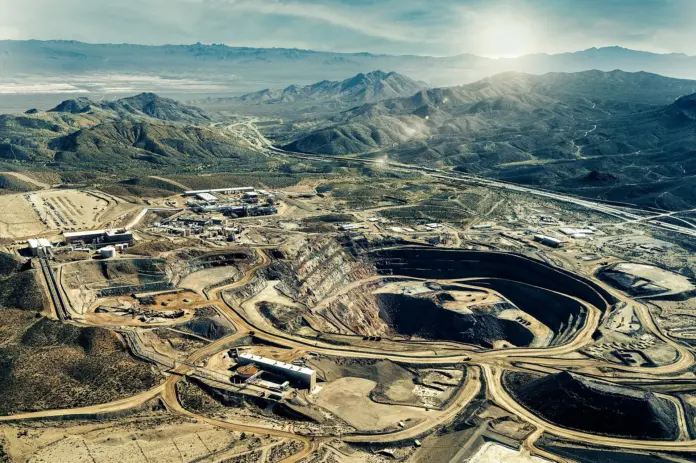 The most repeated sentence about MP Materials is also the least accurate one: that Washington "bought a stake" in the rare earth miner the way it bought a stake in Intel. It did not. The US Department of Defense put <strong>$400m into newly created convertible preferred stock</strong> plus a warrant, at a conversion price of <strong>$30.03 a share</strong> — an instrument with a liquidation preference, a conversion option and an entirely different risk profile from the ordinary common stock Washington took in Intel. One is a structured security that sits above the equity; the other is the equity. That distinction decides who eats the dilution, who captures the upside, and what happens if the business disappoints. With MP trading at <strong>$55.66</strong> — <strong>44.5% below its 52-week high of $100.25</strong> — the instrument is not a footnote. It is the whole argument.
Here is the part almost every write-up gets backwards. Federal equity positions in private companies have gone from emergency measure to standing policy, a pattern the Cato Institute's Tad DeHaven catalogued on 30 July 2026 under the headline <a href="https://www.cato.org/blog/government-ownership-stakes-companies-becoming-routine-under-trump">"Government Ownership Stakes in Companies Becoming Routine Under Trump"</a>. But those positions are not one thing. Intel's was taken in common stock, the plainest instrument available. Lithium Americas' is a set of <em>penny warrants</em> — 5% of the company's common shares plus a separate 5% economic stake in the Thacker Pass joint venture — issued not for cash but in exchange for the DOE deferring $184m of debt service on its DOE loan, per the company's <a href="https://www.sec.gov/Archives/edgar/data/1966983/000119312525233937/d10878d8k.htm">8-K filed 8 October 2025</a>. MP's is convertible preferred with a ten-year commodity price floor bolted on. Three deals, three instruments, three completely different answers to the question every investor in this sector is actually asking: <em>what does the taxpayer's presence on the cap table do to my shares?</em>
And the answer, once you separate the instruments, is not flattering to the lazy version of the bull case. Run MP's numbers: $400m converting at $30.03 buys about 13.3 million shares, worth roughly <strong>$741m</strong> at the $55.66 spot. The taxpayer is up around 85% on paper. But notice what the structure did — the government took an instrument that sits <em>senior</em> to common stock and converts only when it chooses. Lithium Americas went further still: its DOE warrants are <em>penny warrants</em>, meaning the exercise price is nominal and the government paid nothing for the equity at all, receiving it as consideration for deferring debt service. Preferred stock and penny warrants are what a counterparty negotiates when it wants the upside without the downside. That tells you how Washington itself priced the risk in strategic minerals — and it is a warning the equity market has spent the last twelve months learning the hard way.
Key facts: MP Materials at a glance
<strong>Share price $55.66</strong>, up 2.86% (+$1.55) on the session — close of 13 August 2026 (<a href="https://stockanalysis.com/stocks/mp/">StockAnalysis.com</a>)
<strong>52-week range $37.81 – $100.25</strong>; spot sits 44.5% below the high and 47.2% above the low
<strong>One-year change −26.2%</strong>, from $75.40 to $55.66
<strong>Market capitalisation $9.91bn</strong> on 178.1 million shares outstanding, against trailing revenue of $416.25m — roughly <strong>23.8x sales</strong> for a company that is not yet profitable
<strong>Q2 2026 revenue $108.5m</strong>, up 89% year on year; adjusted EBITDA <strong>$28.5m</strong> versus $(12.5)m a year earlier; net loss <strong>$(20.3)m</strong> (<a href="https://mpmaterials.com/news/mp-materials-reports-second-quarter-2026-results">MP Materials, 6 August 2026</a>)
<strong>DoD investment $400m in convertible preferred</strong> at a $30.03 conversion price, plus a warrant — together 15% of common on an as-converted, as-exercised basis (<a href="https://mpmaterials.com/news/mp-materials-announces-transformational-public-private-partnership-with-the-department-of-defense-to-accelerate-u-s-rare-earth-magnet-independence">MP Materials, 10 July 2025</a>)
<strong>NdPr price floor of $110/kg for ten years</strong>, plus a ten-year offtake guarantee covering 100% of magnet output from the 10X facility
<strong>Cash and short-term investments $1.45bn</strong> at 30 June 2026, down from $1.83bn at year-end 2025 — a first-half draw of roughly $380m
What the Department of Defense actually bought
On 10 July 2025, MP Materials announced what it called a transformational public-private partnership with the Department of Defense. The equity element was $400m of a newly created series of convertible preferred stock, convertible into common at $30.03 a share, accompanied by a warrant. Taken together and assuming full conversion and exercise, the government's position represented 15% of MP's issued and outstanding common stock as measured on 9 July 2025. That is the number most coverage quotes. It is also the number most coverage misreads, because 15% "as converted" is a hypothetical share count, not a present ownership position.
The equity was the smallest part of the package. Alongside it came a <strong>$110 per kilogram price floor on neodymium-praseodymium (NdPr) oxide running for ten years</strong> — a direct commodity hedge underwritten by the US taxpayer. There was a $150m loan from the department — since restyled the Department of War — for heavy rare earth separation capacity at Mountain Pass. There was $1.0bn of construction financing committed by JPMorgan Chase Funding and Goldman Sachs Bank USA for the "10X" magnet facility, which MP sited at Northlake, Texas in February 2026 and expects to begin commissioning in 2028 at roughly 10,000 metric tonnes of annual magnet capacity. And there was an offtake commitment under which the DoD ensures 100% of the magnets produced at 10X are purchased by defence and commercial customers for the ten years following construction.
"This initiative marks a decisive action by the Trump administration to accelerate American supply chain independence," said <strong>James Litinsky, Founder, Chairman and Chief Executive of MP Materials</strong>, in the announcement. The company has not announced any new US government equity transaction since; its most recent policy-facing publication, <a href="https://mpmaterials.com/news/project-swarm-sovereign-airspace-requires-a-sovereign-supply-chain">Project Swarm</a>, dated 30 July 2026, is an argument about drone supply chains rather than a corporate action. Anyone who has seen a "$400m stake, July 2026" headline is reading a recycled version of a July 2025 event.
Stack that against the other two. Intel's arrangement, agreed on 22 August 2025, put the government into <strong>common stock</strong> — roughly a 10% holding, structured as a passive position without board representation. The precise share count and consideration have been reported inconsistently across outlets, and we have flagged that in our own <a href="https://financefeeds.com/intel-stock-prediction-148-bull-case-62-bear-case/">Intel INTC stock prediction</a>; what is not in dispute is the instrument. Common stock is common stock. It takes the full ride in both directions.
Lithium Americas is the third model, and it is documented precisely because it went through an SEC filing. Under the omnibus waiver, consent and amendment executed on 7 October 2025, the DOE agreed to defer $184m of scheduled debt service out of the first five years of its loan — unlocking a $435m first draw — in exchange for penny warrants exercisable at $0.01 over 5% of Lithium Americas' outstanding common shares, plus separate penny warrants over a 5% economic stake in the Thacker Pass joint venture. Lithium Americas also agreed to post an additional $120m to loan reserve accounts. The government committed no fresh capital and its warrants cost essentially nothing to exercise.
That is the taxonomy, and it matters for a simple reason. Common stock is dilutive immediately and gives the state uncapped exposure to both directions. Convertible preferred is dilutive only on conversion, sits senior in a wind-down, and hands the state downside protection the ordinary shareholder does not have. Penny warrants cost the issuer no cash up front and dilute only if the equity works. If you own MP common stock, you sit behind a preferred instrument already struck deep in the money. That is not a disaster. It is simply not the same thing as having the Treasury standing shoulder to shoulder with you in the ordinary shares — and the distinction is worth more to your risk assessment than any of the headline stake percentages.
Why the stock is still 44.5% below its high
Here is the tension that defines MP Materials in August 2026. The policy backstop is arguably the strongest in the government's whole portfolio of corporate positions — rare earths are the least ambiguous national security case on the list, because unlike semiconductors or lithium there is effectively no Western alternative to Chinese separation and magnet capacity at scale. And yet the stock has fallen 26.2% over twelve months, from $75.40 to $55.66, and sits 44.5% below its 52-week high.
The market, in other words, is not pricing the politics. It is pricing execution and Chinese price pressure. Both are visible in the Q2 2026 numbers.
Revenue of $108.5m was up 89% year on year, and adjusted EBITDA swung to a positive $28.5m from $(12.5)m. Those are genuinely good prints. But the operational detail is mixed. NdPr production rose 41% to 840 metric tonnes and NdPr sales jumped 127% to 1,006 tonnes — a company selling meaningfully more than it produced in the quarter, drawing down inventory. Meanwhile <strong>rare earth oxide production in concentrate fell 16% to 11,072 tonnes</strong>. The upstream mine is not growing; the midstream refining is. And the company still lost $20.3m at the net line.
Now the number that settles the argument, and it is buried in the 10-Q rather than the earnings release. The price floor is not theoretical — <strong>it is being paid right now.</strong> MP recognised <strong>$17.6m of income under the price protection agreement in Q2 2026, and $59.9m across the first half</strong>, which means the benchmark NdPr price sat below $110/kg for the entire six months and the US government covered the shortfall every quarter (<a href="https://www.sec.gov/Archives/edgar/data/1801368/000180136826000048/mp-20260630.htm">MP Materials Form 10-Q, filed 7 August 2026</a>).
Work it through. MP booked $94.4m of NdPr oxide and metal revenue on 1,006 tonnes sold — roughly <strong>$93.9/kg realised in the market</strong>. Add the $17.6m top-up and the effective price becomes about <strong>$111.3/kg</strong>. In other words, on our calculation close to <strong>16% of MP's NdPr revenue in the quarter came from the taxpayer rather than from a customer.</strong> That is not a subsidy at the margin of this business. On the most important product line, it is a material part of the revenue. Strip it out and the economics are set in Beijing.
One caveat that cuts the other way, and it matters for the bull case. First-half PPA income of $59.9m implies roughly $42.3m in Q1 against $17.6m in Q2 — the shortfall shrank about 60% quarter on quarter. NdPr prices are climbing back toward the floor, not falling away from it. That is the single most encouraging trend in the filing.
Then there is the cash. MP held $1.45bn in cash and short-term investments at 30 June 2026, down from $1.83bn at the end of 2025 — a first-half draw of about $380m as 10X construction accelerated. That is a manageable burn against a $9.91bn market capitalisation, but it is a burn, and the heaviest capital spending on a 2028 commissioning date has not happened yet. This is a capital-intensive industrial build being valued at 23.8 times trailing sales, which is a technology multiple attached to a mining balance sheet. The same disconnect has punished other policy-favoured industrials this year, from small modular reactors — see our <a href="https://financefeeds.com/nuscale-smr-stock-prediction-18-bull-4-50-bear/">NuScale SMR stock prediction</a> — to the broader Western mining listings covered in <a href="https://financefeeds.com/baron-securities-launches-to-bring-canadian-mining-companies-to-londons-capital-markets/">Baron Securities' London push for Canadian miners</a>.
Price levels: where $82 and $38 sit
<em>MP Materials share price with bull and bear targets mapped against the 52-week range. Price data: StockAnalysis.com, close of 13 August 2026.</em>
To be explicit about direction, because a price-target article that gets this backwards is worse than useless: <strong>the $82.00 bull case sits above the current price of $55.66, and the $38.00 bear case sits below it.</strong>
<strong>Bull case $82.00 — that is +47.3% above the $55.66 spot.</strong> It is also 18.2% <em>below</em> the 52-week high of $100.25, which makes this a recovery target rather than a new-high target. MP has traded at $82 within the past year.
<strong>Bear case $38.00 — that is −31.7% below the $55.66 spot.</strong> It sits just 0.5% above the 52-week low of $37.81, which makes it a retest of the low rather than a new-low scenario.
<strong>Sell-side consensus $75.28</strong>, or +35.3% from spot, on a Strong Buy rating across 18 analysts — 13 Strong Buy, 5 Buy, no Holds or Sells (StockAnalysis.com, 13 August 2026). The published range runs from a <strong>high of $100 to a low of $58</strong>. Note that even the most bearish analyst on the tape sits above our $38 bear case, while Canaccord Genuity's George Gianarikas is at exactly <strong>$82</strong> — our bull number. Our bear case is deliberately outside the sell-side range.
<strong>The DoD conversion price of $30.03</strong> is 46.1% below spot. Even in the bear case at $38, the government's preferred remains meaningfully in the money — which is precisely why the state's position tells you far less about MP's equity risk than commentators assume.
The $82 bull case: +47.3% above spot
The bull case does not require a rare earth mania. It requires three things to line up.
<strong>First, 10X execution on schedule.</strong> The Northlake, Texas campus was sited in February 2026 with commissioning targeted from 2028 and roughly 10,000 tonnes of annual magnet capacity. Magnets are where the margin lives — MP has spent five years arguing that the value in rare earths is downstream of the mine, and the Q2 mix (NdPr up, oxide-in-concentrate down 16%) shows management acting on that thesis rather than merely stating it. Every construction milestone that lands on time converts a 2028 promise into a discountable cash flow, and at 23.8x trailing sales the multiple is entirely a function of how credible that 2028 number looks.
<strong>Second, the offtake removes the demand question.</strong> The commitment that 100% of 10X magnet output is purchased for ten years following construction is, functionally, a take-or-pay contract with the strongest counterparty in the world. Very few industrial builds anywhere carry that. Combined with the $110/kg NdPr floor, MP has both a price hedge and a volume hedge on its core product for a decade — a combination that should compress the risk premium the market is currently applying.
But read the floor's small print, because it is genuinely two-sided and almost nobody reports the second half. The price protection agreement runs from 1 October 2025 to 31 December 2035, and when the benchmark rises <em>above</em> $110/kg — with 10X at full capacity — <strong>MP pays the government 30% of the excess.</strong> The taxpayer did not buy a floor; it bought a collar. That caps a slice of the upside in exactly the scenario the bulls are underwriting, and it is another reminder that the instrument, not the headline, is where the economics live.
<strong>Third, demand is being locked in ahead of the plant.</strong> On 30 July 2026 MP published <a href="https://mpmaterials.com/news/project-swarm-sovereign-airspace-requires-a-sovereign-supply-chain">Project Swarm</a>, an initiative aggregating magnet demand across US and allied drone makers, motor and propulsion suppliers and defence technology firms, reserving 10X capacity at Northlake and offering earlier access at its Independence facility in Fort Worth. MP says several drone manufacturers have signed term sheets; no dollar figures were disclosed. The regulatory hook underneath it is that US defence acquisition rules on sintered NdFeB magnets extend across the supply chain in 2027, which converts a preference for domestic magnets into a requirement.
<strong>Fourth, the balance sheet holds.</strong> $1.45bn of cash plus $1.0bn of committed construction financing from JPMorgan and Goldman, plus the $150m DoD loan, covers a lot of the build without a dilutive equity raise. Avoiding that raise is arguably the single largest swing factor in the share price between here and 2028.
Get all three and $82 is not aggressive. It is the price the stock traded at inside the last twelve months, applied to a business with materially better EBITDA, higher NdPr volumes and a de-risked funding path than it had then. What it is <em>not</em> is a bet on the government stake. The preferred was struck at $30.03; it does nothing for common holders at $82 except dilute them.
The $38 bear case: −31.7% below spot
The bear case is simpler and, uncomfortably, needs fewer things to go wrong.
<strong>China sets the price, and the floor proves it.</strong> A $110/kg government floor only exists because the market price is capable of going below it. Chinese separation and magnet capacity dwarfs everything in the West combined, and the marginal cost curve there is lower. If Beijing chooses to defend market share on price — as it has repeatedly across solar, batteries and refined lithium — MP's realised prices compress toward the floor and the taxpayer, not the customer, makes up the difference. That is fine for MP's cash flow and terrible for MP's multiple, because a company earning a legislated price is valued as a utility, not as a growth stock. In fairness to the bulls, this is the bear argument currently working <em>least</em> well: the PPA shortfall shrank roughly 60% between Q1 and Q2 2026, and China agreed in November 2025 to suspend the expanded export controls it had rolled out through that year as part of a US-China trade understanding. Prices are recovering. The risk is that the suspension is a policy choice Beijing can reverse, not a structural change. The same dynamic that repriced Western memory and chip names when Chinese capacity arrived — documented in our coverage of <a href="https://financefeeds.com/cxmt-466-percent-shanghai-debut-micron-sk-hynix-no-hbm-prospectus/">CXMT's 466% Shanghai debut and its effect on Micron and SK Hynix</a> — is the template.
<strong>The capital structure is heavier than the cash balance suggests.</strong> The $1.45bn cash figure is the number bulls quote; the 10-Q also shows <strong>$862.8m of 2030 convertible notes outstanding</strong>, a $150m Samarium project loan, and net long-term debt of roughly $934.6m against total liabilities of $1.36bn. The converts carry a conversion price near $21.74, far below spot, so they are effectively equity-in-waiting. Sitting above all of it is the government's Series A preferred, carried at a <strong>liquidation preference of $428.1m</strong> at 30 June 2026. Common shareholders are at the back of a longer queue than the headline balance sheet implies.
<strong>Execution slips are expensive at this multiple.</strong> Oxide production already fell 16% year on year. Q2 NdPr sales of 1,006 tonnes exceeded production of 840 tonnes, meaning inventory did some of the work; that is not repeatable indefinitely. A 2028 commissioning date that becomes 2029, or a capital cost overrun on a first-of-its-kind US magnet campus, hits a stock trading at 23.8x sales far harder than it would hit a conventional miner at 1.5x. The cash draw of $380m in a single half-year is the number to watch each quarter.
<strong>Policy is not permanent.</strong> The federal equity programme Cato documented is an administration policy, not a statute. Contracts survive administrations; enthusiasm does not, and neither necessarily does the appetite to fund a floor that may cost real money. Note that the arrangement is asymmetric by design: the DoD's preferred sits senior and its conversion is struck at $30.03. If MP's equity fell to $38, the government's position would still be well in the money while common holders absorbed a 31.7% loss.
Put those together and $38 is a retest of the 52-week low of $37.81, not a collapse into uncharted territory. It is where the stock goes if the market decides MP is a subsidised commodity processor rather than a strategic growth asset. The company itself has not commented on any specific price level, and nothing here reflects guidance — MP provided no forward guidance with its Q2 2026 results.
The regulatory tension nobody wants to name
There is an unresolved contradiction sitting inside every one of these deals, and it is sharper at MP than anywhere else in the portfolio.
The state is simultaneously MP's largest strategic shareholder-in-waiting, its price-floor underwriter, its lender, and the guarantor of its customer base. Those roles conflict. A price floor funded by the taxpayer creates an incentive to maximise volume into the floor rather than to compete on cost. An offtake guarantee removes the commercial discipline of having to win customers. And a preferred instrument held by a regulator that also sets export policy on the same commodity is a governance question no US listed company has previously had to answer at this scale.
None of this is illegal or even unusual by the standards of industrial policy elsewhere — it is roughly how Japan and Korea built their materials sectors. But it is new for a NYSE-listed equity, and the market's 44.5% discount to the high is at least partly a discount for that novelty. Investors do not yet have a valuation framework for a company whose price, volume and capital structure are all partly set by policy. Nor, judging by the fact that the sell-side consensus of $75.28 sits 35.3% above spot while the shares keep drifting, does the sell-side.
The comparison with defence-adjacent software is instructive here — companies like Palantir, covered in our <a href="https://financefeeds.com/pltr-stock-prediction-245-bull-case-98-bear-case/">Palantir PLTR stock prediction</a>, carry government revenue concentration without government ownership, and the market has been far more willing to pay up for that. Revenue from the state is a contract. Equity held by the state is a relationship, and relationships get repriced.
What happens next
Three concrete expectations, with the reasoning attached.
<strong>1. The next two quarters are about oxide production, not headlines.</strong> Q2's 16% decline in rare earth oxide production in concentrate is the metric that most directly threatens the 2028 magnet ramp, because 10X needs feedstock. If Q3 2026 shows oxide output stabilising while NdPr volumes keep climbing, the bull path to $82 stays open. If oxide falls again while NdPr sales continue to outrun production, the inventory cushion thins and the bear case gains its most credible catalyst.
<strong>2. Expect more preferred-and-warrant structures, not more common-stock purchases.</strong> Taking common stock exposes the taxpayer to the full downside and invites the charge that the state is punting public money on a single equity. The MP structure — preferred, senior, with a price floor and an offtake — and the Lithium Americas structure — penny warrants for a debt concession — both achieve the strategic goal while protecting the government if the company disappoints. As the portfolio grows, those are the templates that are easier to defend politically, and investors in the next strategic-minerals listing should expect to sit behind a preferred rather than alongside common.
<strong>3. The valuation gap closes downward before it closes upward.</strong> A stock at 23.8x trailing sales with a $20.3m quarterly net loss and a 2028 revenue inflection is carrying a lot of duration. In an environment where commodity-linked equities have been volatile — see our recent <a href="https://financefeeds.com/gold-jumps-7-2-percent-quiet-august-myth-market-wrap/">gold market coverage</a> — that duration is the first thing sold. The path from $55.66 to $82 most plausibly runs through a lower number first.
The honest summary is that MP Materials is the clearest national-security case in Washington's equity portfolio and simultaneously one of its hardest equities to value. The policy backstop is real, verified and generous. It is also, at $110/kg and a decade-long offtake, an admission that this business does not yet stand on its own economics. Both of those things are true, and the 44.5% drawdown from the high is what it looks like when a market tries to hold them at once.
Frequently asked questions
<strong>Did the US government buy a $400m stake in MP Materials in July 2026?</strong>
No. The $400m figure is accurate but the date is not. The Department of Defense announced the investment on 10 July 2025, and it was structured as convertible preferred stock at a $30.03 conversion price plus a warrant — together 15% of common on an as-converted, as-exercised basis. MP Materials has announced no new US government equity transaction in July or August 2026.
<strong>What is MP Materials' share price today?</strong>
MP Materials closed at $55.66 on 13 August 2026, up 2.86% or $1.55 on the day, with a session range of $53.25 to $56.02 and volume of 6.33 million shares. That leaves the stock 44.5% below its 52-week high of $100.25 and 47.2% above its 52-week low of $37.81.
<strong>How is the MP Materials government stake different from Intel's?</strong>
Intel's, agreed 22 August 2025, was taken in common stock as a roughly 10% passive position. MP's is convertible preferred plus a warrant, converting at $30.03. Common stock takes the full downside; preferred sits senior with a liquidation preference and converts only when it suits the holder. Lithium Americas is a third structure again — penny warrants over 5% of its shares and 5% of the Thacker Pass JV, granted in October 2025 in exchange for the DOE deferring $184m of debt service rather than for cash.
<strong>What is the $110/kg NdPr price floor?</strong>
Under the July 2025 DoD partnership, the US government guarantees MP Materials a floor price of $110 per kilogram on neodymium-praseodymium oxide for ten years. If the market price falls below that level, the shortfall is covered. It is a direct commodity hedge for MP and, in practice, the single most important line item in the company's economics.
<strong>Is the $82 bull case above or below the current price?</strong>
Above. At $55.66 spot, the $82.00 bull target represents 47.3% upside, and it remains 18.2% below the 52-week high of $100.25 — so it is a recovery to a level the stock traded at within the past year, not a breakout to new highs. The $38.00 bear case is 31.7% below spot and sits 0.5% above the 52-week low.
<strong>What would break the bull case fastest?</strong>
A further decline in rare earth oxide production in concentrate, which fell 16% year on year in Q2 2026. The 10X magnet campus needs upstream feedstock to justify its 2028 commissioning. A second consecutive decline, combined with NdPr sales continuing to exceed production and draw down inventory, would undermine the ramp story that the current 23.8x sales multiple depends on.
<strong>Where do analysts see MP Materials going?</strong>
The sell-side consensus price target is $75.28, roughly 35.3% above the $55.66 spot, on a Strong Buy consensus rating (StockAnalysis.com, 13 August 2026). That sits between the $38 bear case and the $82 bull case, and nearer the bull.
<em><strong>Disclaimer:</strong> This article is analysis and information only. It is not investment advice, nor a recommendation to buy or sell any security. Price targets are scenario analysis, not forecasts, and shares can fall as well as rise. All prices are as at the close of 13 August 2026 and will have changed. Readers should conduct their own research and consider taking independent financial advice before making any investment decision.</em>