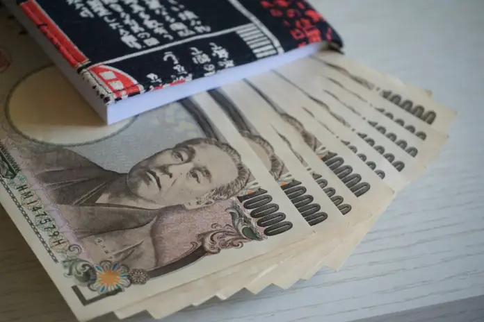 The most revealing detail of the first joint US-Japan yen-buying operation since 1998 is not the size — it is the funding. The US Treasury bought yen by selling <em>euros</em>, not dollars, per <a href="https://finance.yahoo.com/markets/currencies/articles/japan-vow-coordination-us-weak-210127634.html">Yahoo Finance's account of the operation</a> — an intervention engineered to strengthen the yen without Washington technically selling its own currency. That construction let the administration back its ally against a 40-year yen low while preserving its strong-dollar rhetoric, and it is why strategists are treating Friday's action as politically durable rather than a one-off gesture. The common assumption that intervention never works against a rate differential misses what actually changed here: for the first time in a generation, the yen has a defender on both sides of the Pacific. USD/JPY traded at 157.77 on Monday, per Yahoo Finance data from August 4, 2026, down from 163.86 at the July peak.
The scale was historic on the Japanese side. Tokyo spent a record ¥8.45 trillion (about $59 billion) in a solo operation on Thursday, July 30, then roughly ¥5.33 trillion ($36.6 billion) more in Friday's coordinated round with the Treasury — nearly ¥13.8 trillion in two sessions — after the yen touched 163.73, its weakest in four decades. For perspective: Japan's entire celebrated 2022 defence of the yen, spread across five weeks in September and October, totalled ¥9.18 trillion, per <a href="https://www.nippon.com/en/japan-data/h01492/">Ministry of Finance figures compiled by Nippon.com</a>. Tokyo just exceeded that campaign by roughly 50% in two trading days. The joint move was the first coordinated intervention of any kind since the 2011 post-earthquake action, and the first aimed at <em>buying</em> yen since 1998. The pair snapped as low as 155.20 before settling. For FX desks, the operational lesson is that the intervention now has two reaction functions to model, not one — and the second belongs to a Treasury with its own tariff arithmetic to protect.
<strong>Key Facts: The July 30–31 Yen Intervention</strong>
¥8.45 trillion (~$59 billion) — estimated record single-day solo intervention by Japan on July 30, 2026 — <a href="https://finance.yahoo.com/markets/currencies/articles/instant-view-yen-jumps-against-142545189.html">Reuters via Yahoo Finance, July 30, 2026</a>
¥5.33 trillion (~$36.6 billion) — Japan's estimated share of the joint US-Japan round on July 31, taking the two-day total to ~¥13.8 trillion — <a href="https://www.cnbc.com/2026/08/03/yen-intervention-us-japan-trump-bessent-katayama.html">CNBC, August 3, 2026</a>
163.73 — USD/JPY's pre-intervention peak, the yen's weakest level in 40 years; the pair hit 155.20 post-intervention and closed Monday at 157.77 — Yahoo Finance data, August 4, 2026
$833 million — the size of the last joint US yen-buying operation, on June 17, 1998, split evenly between the Treasury's Exchange Stabilization Fund and the Federal Reserve — <a href="https://www.newyorkfed.org/newsevents/news/markets/1998/fx980730">New York Fed FX report, July 1998</a>
¥9.18 trillion — Japan's entire September–October 2022 intervention campaign, exceeded by ~50% in just two days this time — <a href="https://www.nippon.com/en/japan-data/h01492/">Nippon.com/MoF data</a>
1.545% — Japan's two-year JGB yield, the highest since 1995, as markets price a possible September BoJ hike — Yahoo Finance, August 2026
63,445.53 — the Nikkei 225's Monday close, down 1.4% as exporters absorbed the stronger yen — <a href="https://newsonjapan.com/article/150222.php">News On Japan, August 3, 2026</a>
How the ¥13.8 Trillion Operation Actually Worked
Currency intervention in Japan is a government decision, not a central-bank one. The Minister of Finance holds sole legal authority over FX policy; the Bank of Japan merely executes orders as the ministry's agent, drawing on the Foreign Exchange Fund Special Account (FEFSA) — the government account that houses Japan's foreign reserves, per the <a href="https://www.boj.or.jp/en/intl_finance/outline/expkainyu.htm">BoJ's own outline of its intervention operations</a>. That distinction matters for capacity. When Japan sells yen to weaken its currency, it can print unlimited amounts. When it <em>buys</em> yen, as it did last week, it must sell finite foreign-currency assets — which is why every yen-buying campaign carries an implicit ammunition question.
The ¥8.45 trillion figure for July 30 is, for now, an analyst estimate rather than an official number. Market participants reverse-engineer intervention size by comparing the BoJ's projections of changes in its current-account balances against money-market forecasts — the gap is the ministry's footprint. Official confirmation follows a fixed calendar: the MoF publishes total intervention amounts monthly, on the final business day of each month, with day-by-day detail released quarterly, per the ministry's <a href="https://www.mof.go.jp/english/policy/international_policy/reference/feio/monthly/index.html">Foreign Exchange Intervention Operations disclosure page</a>. The July 30–31 operations fall into the reporting window published at the end of August — the moment the ¥13.8 trillion estimate becomes fact or gets revised.
Nor was this Tokyo's first attempt of 2026. Japan had already spent a record $73.6 billion supporting the yen in the month to late May, per <a href="https://www.japantimes.co.jp/business/2026/05/30/markets/yen-intervention-japan/">The Japan Times</a> — and the currency still slid to 163.73. That failure is precisely what made the July escalation, first in unprecedented size and then in coordination, the logical next step. The timing itself was a weapon. "If it was indeed an intervention, many market participants had expected it to take place after the FOMC and Bank of Japan meetings, so there may have been an intention to catch the market off guard," said Daisaku Ueno, chief FX strategist at Mitsubishi UFJ Morgan Stanley Securities, who added: "It is hard to imagine anything other than currency intervention causing a drop of as much as 5 yen in such a short period of time," per <a href="https://finance.yahoo.com/markets/currencies/articles/instant-view-yen-jumps-against-142545189.html">Reuters' instant-view survey of strategists</a>.
<strong>Quick Take:</strong> The MoF decides, the BoJ executes, and the money comes from a finite reserve account. The ¥13.8 trillion two-day estimate becomes official on the final business day of August — the next hard catalyst on the intervention calendar.
Industry Response: How Trading Desks and Tokyo Repriced
The first market response was forensic rather than directional — desks worked out what had happened from the shape of the move before any official confirmed it. "The suddenness and degree of the move in dollar/yen suggests intervention," said Tom Nakamura, head of fixed income and currencies at AGF Investments in Toronto. Jonas Goltermann, chief markets economist at Capital Economics, concurred: "The size of the move strongly suggests that this is intervention, though no firm evidence at this point." Yuji Saito, executive advisor at SBI FX Trade in Tokyo, drew the operational distinction that matters to dealers: "This is clearly different from the kind of move you see when rate checks are conducted" — this was live execution, not the ministry phoning banks for quotes, per the same <a href="https://finance.yahoo.com/markets/currencies/articles/instant-view-yen-jumps-against-142545189.html">Reuters survey</a>.
Equities repriced just as fast, and in the opposite direction. The Nikkei 225 closed Monday at 63,445.53, down 1.4%, with Toyota Motor and Murata Manufacturing under early pressure as the yen's 3%-plus surge threatened exporter earnings that had been flattered by currency weakness for months, per <a href="https://newsonjapan.com/article/150222.php">News On Japan's market report</a>. The index was already fragile: it had corrected roughly 18% over five weeks from its June 22 peak of 73,694 before the intervention landed, per <a href="https://www.oanda.com/sg-en/skills-and-insights/education/market-commentary/the-month-ahead/03082026-us-japan-yen-intervention-usdjpy-nikkei-dow-outlook/">OANDA's month-ahead analysis</a>. For a market that spent 2024–2026 treating yen depreciation as an equity subsidy, a state-sponsored yen floor is a regime change, not a data point.
The forced-unwind risk is the part global desks remember viscerally. The last violent yen appreciation — the August 2024 carry-trade unwind after a surprise BoJ hike — took the Nikkei down 12.4% in a single session on August 5, 2024, its worst day since 1987. Nothing of that magnitude has hit this time, in part because this yen rally was engineered gradually by two finance ministries rather than detonated by a surprise central-bank move. But the mechanism — yen-funded leverage forced to close as the funding currency appreciates — is identical, and it is why every macro desk is now modelling 155 as a stress trigger rather than a chart line.
<strong>Quick Take:</strong> FX desks read the move as unmistakably official within minutes; equity desks read it as tightening. A state-backed yen floor reverses the weak-yen trade that powered Japanese exporters — and revives memories of August 2024's carry unwind.
Market Impact: How 2026 Compares With 1998, 2011 and 2022
Every major yen intervention of the past three decades has had a different architecture, and the differences predict outcomes better than the headline sizes. The <a href="https://www.newyorkfed.org/newsevents/news/markets/1998/fx980730">New York Fed's contemporaneous report</a> shows the June 17, 1998 operation — the only prior joint US yen-buying — was tiny by today's standards: $833 million, split evenly between the Treasury's Exchange Stabilization Fund and the Fed. The March 18, 2011 action went the other way, with G7 partners jointly <em>selling</em> yen after the currency spiked to a record 76.25 per dollar in panicked post-earthquake trading — the first coordinated G7 intervention since 2000, per <a href="https://finance.yahoo.com/news/history-japans-intervention-currency-markets-055640598.html">Reuters' history of Japan's currency interventions</a>. The 2022 campaign was solo: ¥2.84 trillion in September and a then-record ¥6.35 trillion in October, after which USD/JPY peaked at 151.94 and turned as the Fed slowed.
Episode
Direction
Scale
Format
Outcome
June 17, 1998
Yen-buying
US sold $833m for yen, alongside Japan
Joint US-Japan
Yen only turned decisively that autumn as carry trades unwound
March 18, 2011
Yen-selling
Concerted G7 sales after record 76.25 yen high
G7 coordinated
Immediate reversal; yen strength capped for months
Sept–Oct 2022
Yen-buying
¥9.18tn over five weeks
Japan solo
USD/JPY peaked at 151.94 on Oct 21, then fell as the Fed pivoted
July 30–31, 2026
Yen-buying
~¥13.8tn in two sessions
Record solo + joint US-Japan
163.73 → 155.20; 157.77 close on August 3
The synthesis across those four episodes: unilateral yen-buying buys weeks, coordination changes trends. The history argues the allies chose the right format — coordinated interventions since 1995 have produced longer-lasting effects than unilateral ones. But the fundamental headwind remains enormous. The policy-rate gap between the Fed's 3.50–3.75% target range and the BoJ's 0.50% still pays roughly 300 basis points to hold dollars against yen, per <a href="https://www.tradingnews.com/news/usd-jpy-price-forecast-cross-reclaims-157-as-trumps-itan-rejection">TradingNews' rate-differential analysis</a>, and Japan's energy bill deepens the structural bleed: the country imports roughly 90% of its primary energy, with every $10 rise in Brent adding an estimated $20 billion to annual import costs — a Hormuz-era tax on the yen. The differential is shifting on both legs at once, though: Japan's two-year yield hit 1.545%, its highest since 1995, with the Bank of Japan signalling a possible September hike after <a href="https://financefeeds.com/global-fx-market-summary-boj-rate-hold-central-bank-inflation-risks-and-middle-east-tensions-drive-volatility-july-31-2026/">holding rates on July 31 amid Middle East-driven volatility</a> — while in the US, <a href="https://financefeeds.com/the-30-year-yield-just-hit-a-19-year-high-and-traders-are-pricing-a-hike-not-a-cut/">the 30-year yield just hit a 19-year high with traders pricing a hike, not a cut</a>. Intervention buys time; only that differential closing makes it stick. And Asia's broader markets, already strained by <a href="https://financefeeds.com/kospi-down-34-from-9114-is-korea-cheap-enough-to-buy-yet/">Korea's 34% KOSPI drawdown</a>, needed the anchor.
<strong>Quick Take:</strong> Two days of 2026 intervention outspent the entire 2022 campaign by ~50%. But with the US-Japan policy-rate gap still near 300bp, the trade that broke the yen remains profitable — which is why the BoJ's September meeting matters more than the next round of dollar sales.
The Policy Tension: Strong-Dollar Doctrine Meets a Yen Defence
The intervention sits inside a genuine contradiction of US policy. Washington has spent decades preaching market-determined exchange rates, and the Treasury publishes a semiannual report policing other countries' one-sided FX intervention — the "currency manipulator" framework. Yet that framework targets governments that intervene to <em>weaken</em> their currencies for trade advantage; buying yen to strengthen it inverts the charge sheet. The G7's own doctrine supplies the legal cover: members have long agreed that while exchange rates should be set by markets, "excess volatility and disorderly movements" can justify action, and that partners will "consult closely" on FX operations, per <a href="https://finance.yahoo.com/news/g7-reaffirm-commitment-warning-against-090119144.html">Reuters' coverage of the G7 exchange-rate commitments</a>. A 40-year low, hit at speed, is as close to a textbook invocation of that clause as modern FX gets.
Why Washington joined is the part markets initially misread. Analysts note a structurally weak yen quietly offsets US tariffs by cheapening Japanese exports — so propping the yen protects the administration's own trade arithmetic, dressed in the language of friendship, per <a href="https://fortune.com/2026/08/03/yen-rises-amid-speculation-of-more-intervention-after-u-s-support/">Fortune's analysis</a>. The euro-funding choice completes the picture: by selling euros rather than dollars, the Treasury strengthened the yen without technically abandoning the strong dollar. President Trump framed US participation as support for an ally, but the sequencing tells its own story: the Treasury stepped in only after Japan had committed a record sum solo — a structure that lets Washington claim partnership while Tokyo carries the balance-sheet risk.
Both governments put their names on it — and kept the door open. "We will not hesitate conducting further coordinated intervention," Finance Minister Satsuki Katayama said Monday, while Treasury Secretary Scott Bessent declared: "We strongly support Japan's decisive market and monetary steps to correct the substantial undervaluation of the yen." Japan's top currency diplomat, Atsushi Mimura, called the joint action the "culmination" of the US-Japan alliance, and the Treasury separately said it "will not hesitate to participate in further joint intervention," per <a href="https://www.cnbc.com/2026/08/03/yen-intervention-us-japan-trump-bessent-katayama.html">CNBC's reporting on the confirmations</a>.
What Happens Next: The Road to 150 — or Back to 164
Three catalysts now govern the pair, in sequence. First, the BoJ's September meeting: with the two-year JGB at 1.545% — its highest since 1995 — markets are already pricing meaningful odds of a hike, and a 25bp move would be the first genuine narrowing of the rate gap from the Japanese side. The prediction here is causal: intervention has created the window, but only a September hike converts the 155.00 break into a trend toward 152.00 and then the 150.00 handle, per <a href="https://www.tradingkey.com/analysis/forex/eur/262070335-usd-to-jpy-forecast-rare-us-intervention-usdjpy-fall-155-exchange-rate-continue-fall-tradingkey">TradingKey's technical read</a>. Second, the MoF's end-of-August disclosure, which will convert the ¥13.8 trillion estimate into an official number — and reveal whether Tokyo kept firing quietly into August. Third, the Fed: if US long yields keep climbing, the differential widens again and the intervention becomes a rearguard action.
The failure scenario is equally specific. A sustained recovery through the 159.45 pivot would signal the correction is over, opening 161.00–161.95 and then a retest of 164 — where the ministry of finance has now shown, twice in two days, exactly what it will do. "Joint US-Japan intervention has broken USD/JPY below its 200-day moving average, signalling a potential multi-week correction," wrote Kelvin Wong, senior market analyst at OANDA, whose roadmap has 155.03 as intermediate support and 152.55 below that, per <a href="https://www.oanda.com/sg-en/skills-and-insights/education/market-commentary/the-month-ahead/03082026-us-japan-yen-intervention-usdjpy-nikkei-dow-outlook/">OANDA's month-ahead outlook</a>.
What to watch: the BoJ's September meeting, Tokyo's monthly intervention data release confirming the totals, and whether 157–158 holds as the new ceiling while the ¥13.8 trillion message sinks in. Two-way risk has returned to the world's most-watched carry trade — courtesy of the first genuinely joint defence of the yen in a generation.
Frequently Asked Questions
<strong>Why did the US Treasury sell euros instead of dollars to buy yen?</strong>
Selling euros let Washington strengthen the yen without technically selling — and thereby weakening — its own currency, preserving the administration's strong-dollar rhetoric. The Treasury holds euro reserves in its Exchange Stabilization Fund, so it could fund the yen purchases from a third currency. Strategists read the construction as evidence the operation was designed to be politically repeatable.
<strong>How big was the 2026 yen intervention compared with 2022?</strong>
Roughly 50% larger — compressed into two days instead of five weeks. Japan's September–October 2022 campaign totalled ¥9.18 trillion, per MoF data. On July 30–31, 2026, Tokyo is estimated to have spent about ¥13.8 trillion: a record ¥8.45 trillion solo, then ¥5.33 trillion in the joint round with the US Treasury.
<strong>When will Japan officially confirm the intervention amounts?</strong>
The Ministry of Finance publishes total intervention figures monthly, on the final business day of each month, with day-by-day detail following quarterly. The July 30–31 operations fall into the window disclosed at the end of August 2026. Until then, the ¥8.45 trillion and ¥5.33 trillion figures are analyst estimates derived from Bank of Japan current-account projections.
<strong>Is coordinated currency intervention allowed under G7 rules?</strong>
Yes, conditionally. G7 members are committed to market-determined exchange rates, but their long-standing agreement recognises that "excess volatility and disorderly movements" in exchange rates harm economic stability and can justify action, with members consulting closely on FX operations. A 40-year yen low reached at speed gave Tokyo and Washington a textbook basis to invoke that exemption.
<strong>What USD/JPY levels matter now?</strong>
On the downside: 155.00, whose decisive break opens 152.00 and then 150.00 — most plausibly on a September BoJ hike. On the upside: the 159.45 pivot; a sustained move above it targets 161.00–161.95 and ultimately a retest of 164, the four-decade extreme where Japan has now demonstrated it will intervene in record size.
<strong>What does the intervention mean for the yen carry trade?</strong>
It restores two-way risk to a trade that had become a one-way bet. The US-Japan policy-rate gap near 300 basis points still pays traders to short yen, but a state-sponsored floor raises the cost of being caught in a squeeze — and the August 2024 unwind, which cut the Nikkei 12.4% in a day, is the template every desk now stress-tests against.